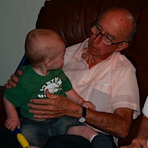 Grandpa and my nephew, Logan, inspect one another earlier this year.
